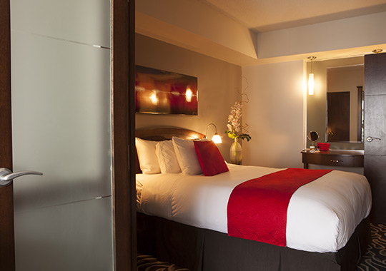 saint-sulpice-deluxe-suites-bedroom.jpg